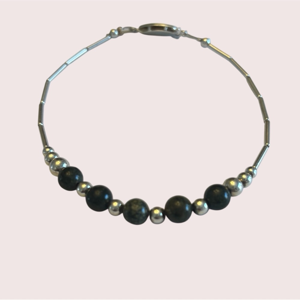 Natural unikite and silver tone bracelet. 8”.